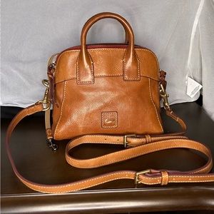 Dooney and Burke mini bag. Used maybe twice. It’s to small for me